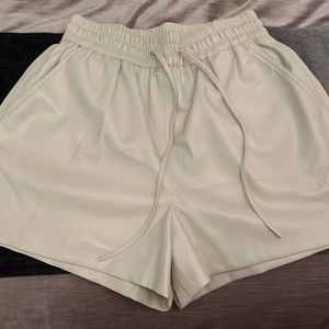 White faux leather shorts , brand new with tags , never been worn